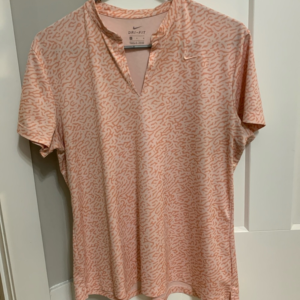 Women’s NIKE golf polo size L